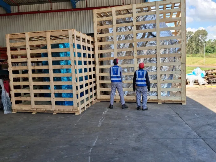 Completed crates with the packing team