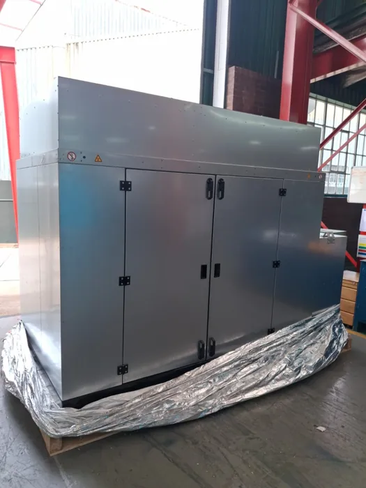 Equipment on a foil-lined base before enclosure